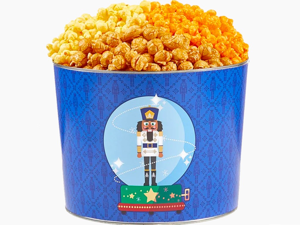 blue nutcracker popcorn tin full of popcorn