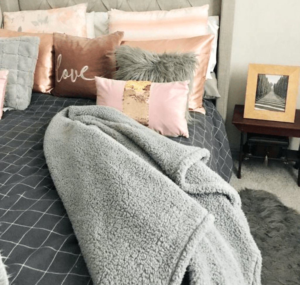 sherpa blanket on bed