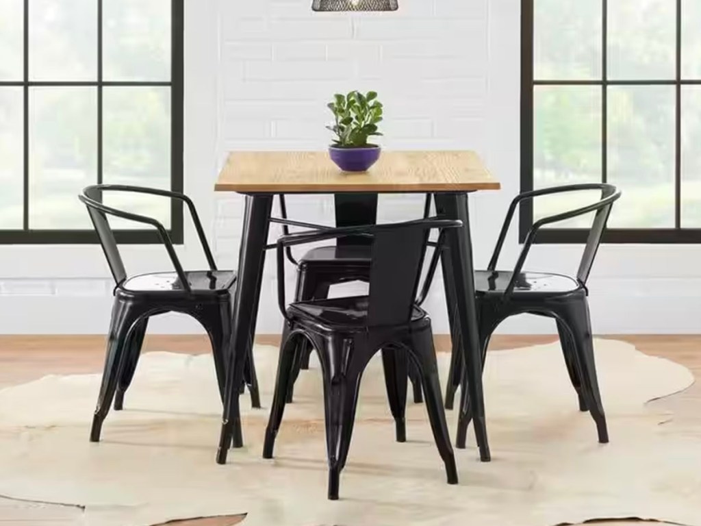 black metal 4 piece chair and dining table
