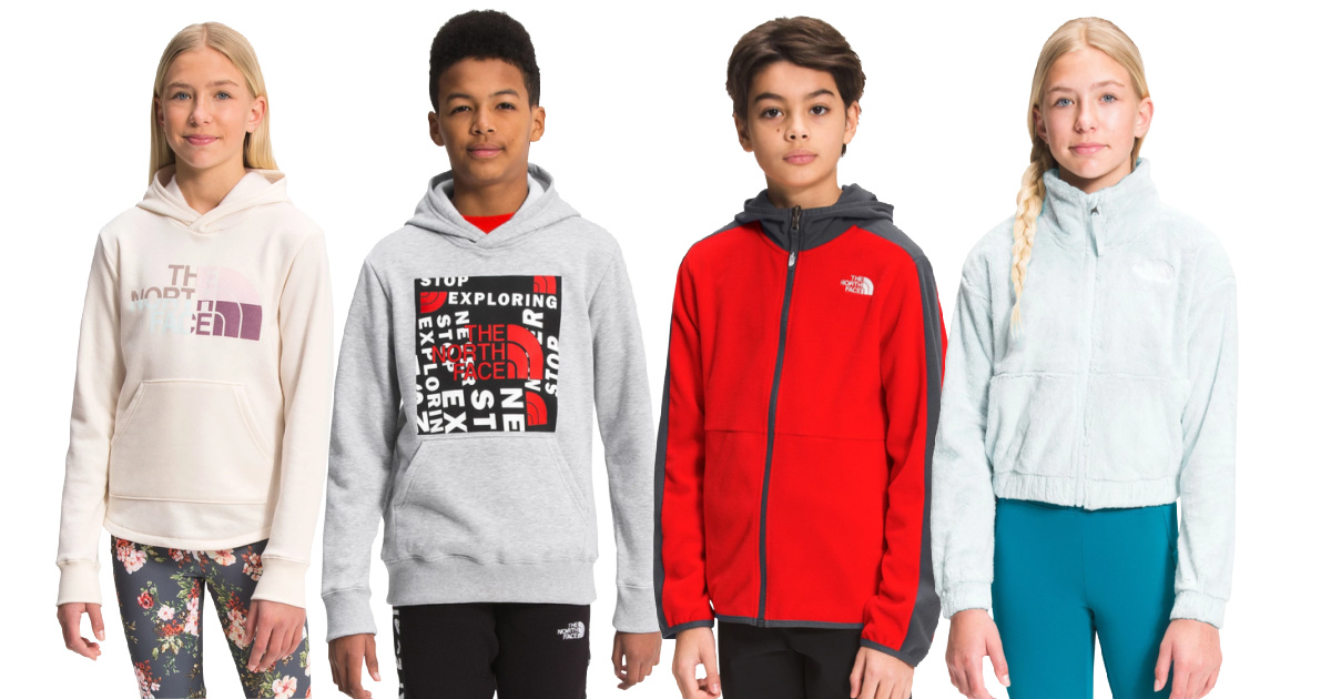 four kids wearing the north face kids hoodies