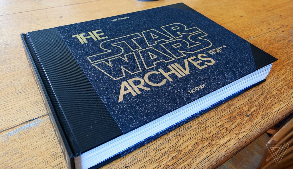 the star wars archives coffee table book on wood table