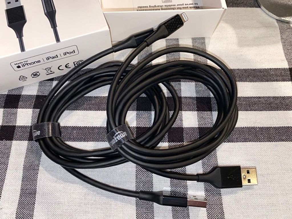 2 black AmazonBasics charging cables