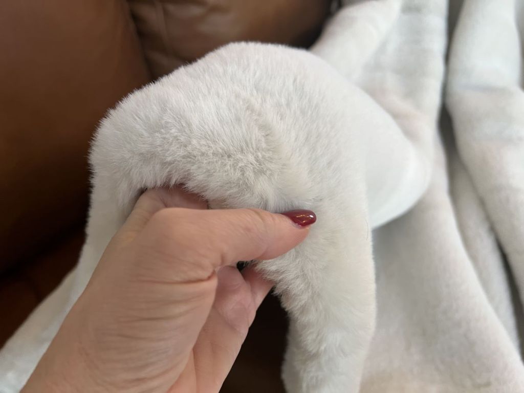 hand holding a blanket