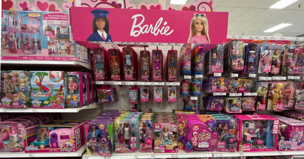 pink display with dolls in boxes 