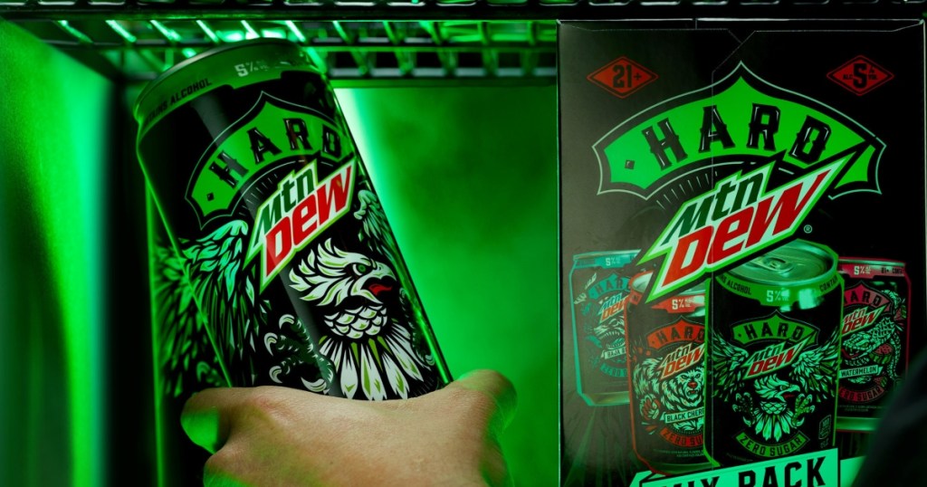 taking a can of Hard Mountain Dew out of refrigerator