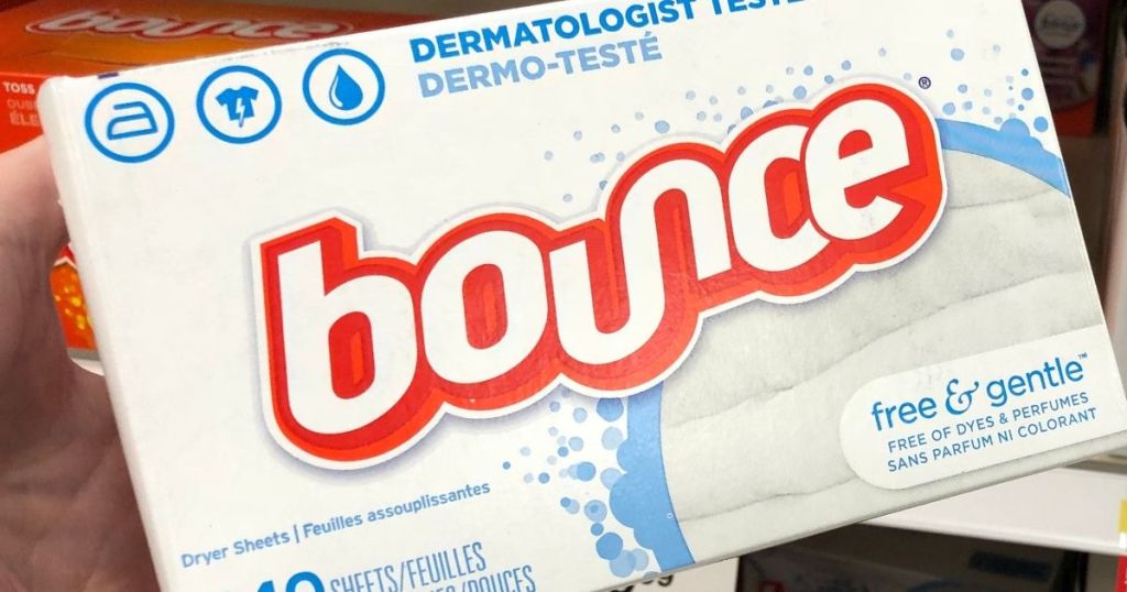 hand holding a box of Bounce Free and Gentle dryer sheets