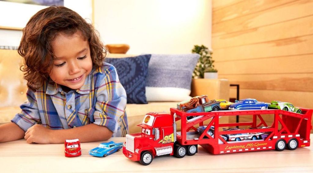boy playing with a toy truck
