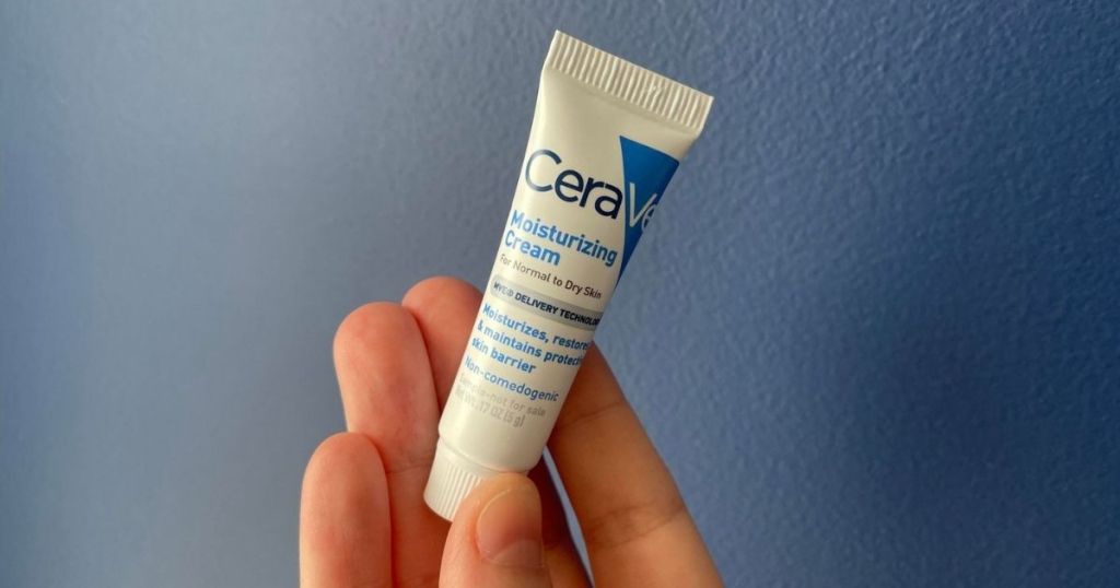 hand holding a CeraVe Moisturizing Cream Sample