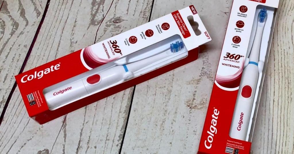 two colgate 360 whitening electric toothbrushes in packaging