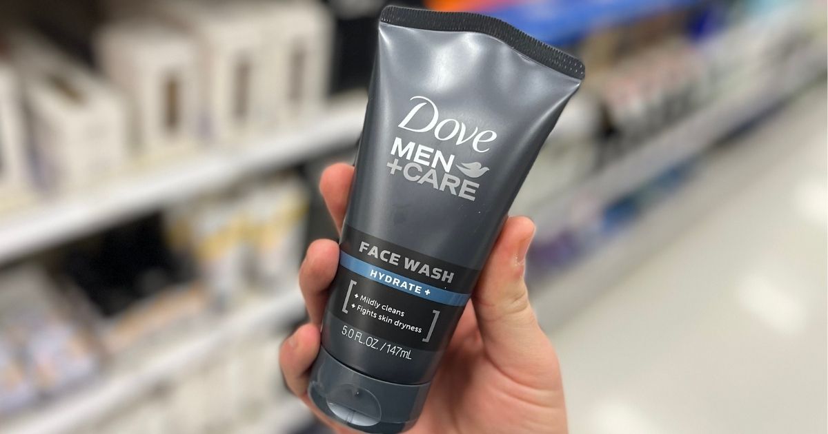 hand holding Dove Men+Care face wash