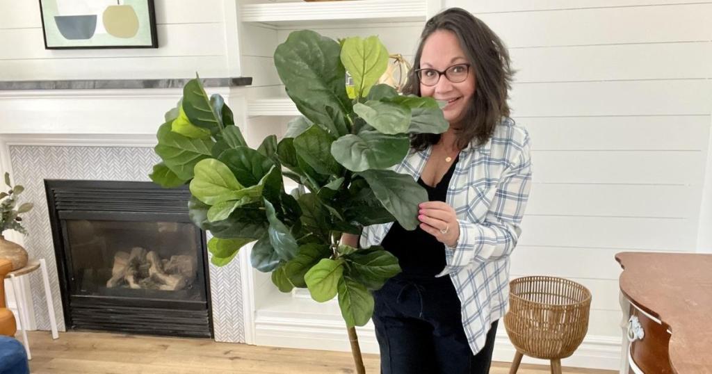 woman with fiddle leaf fig tree faux plant