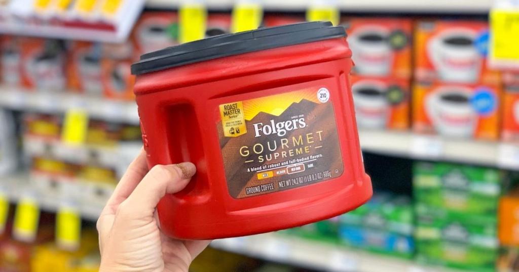 canister of folgers gourmet supreme coffee grounds in store
