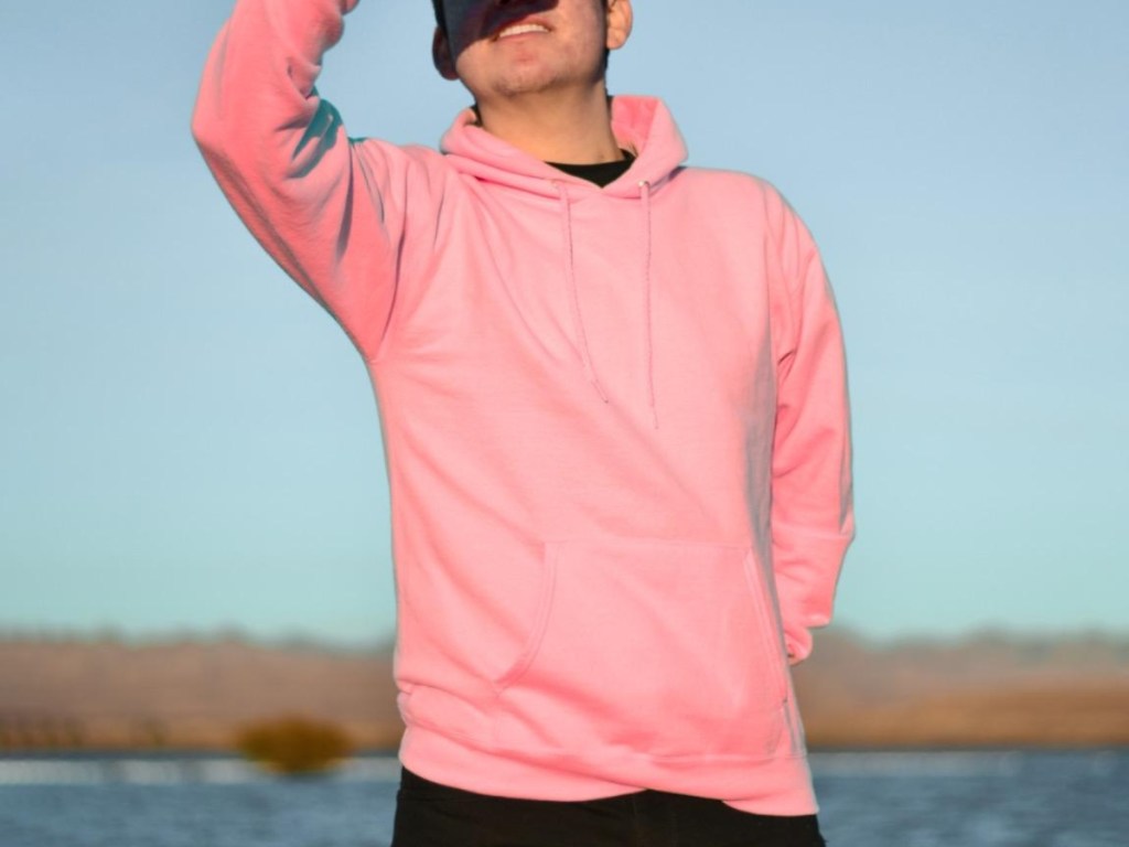 man wearing pink hoodie