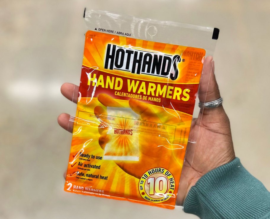 hand holding HotHands Hand Warmer pack