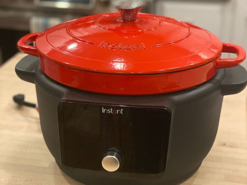 Instant Pot with red lid on counter