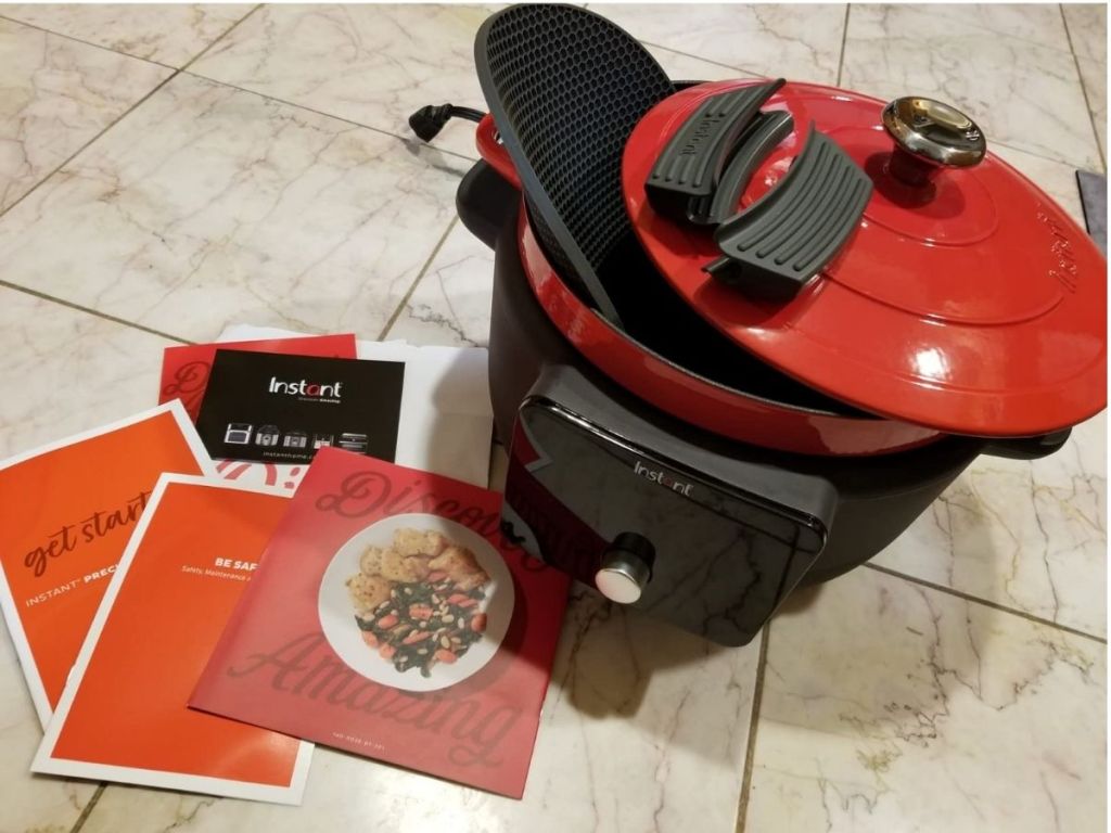Red and black Instant Electic Dutch Oven with mauals and recipe book