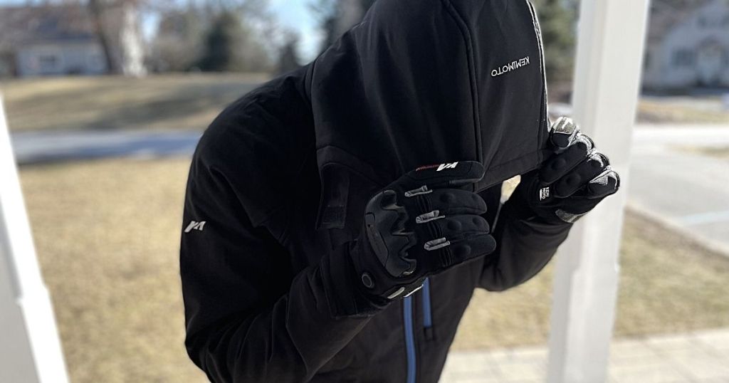man wearing Kemimoto heated jacket and gloves