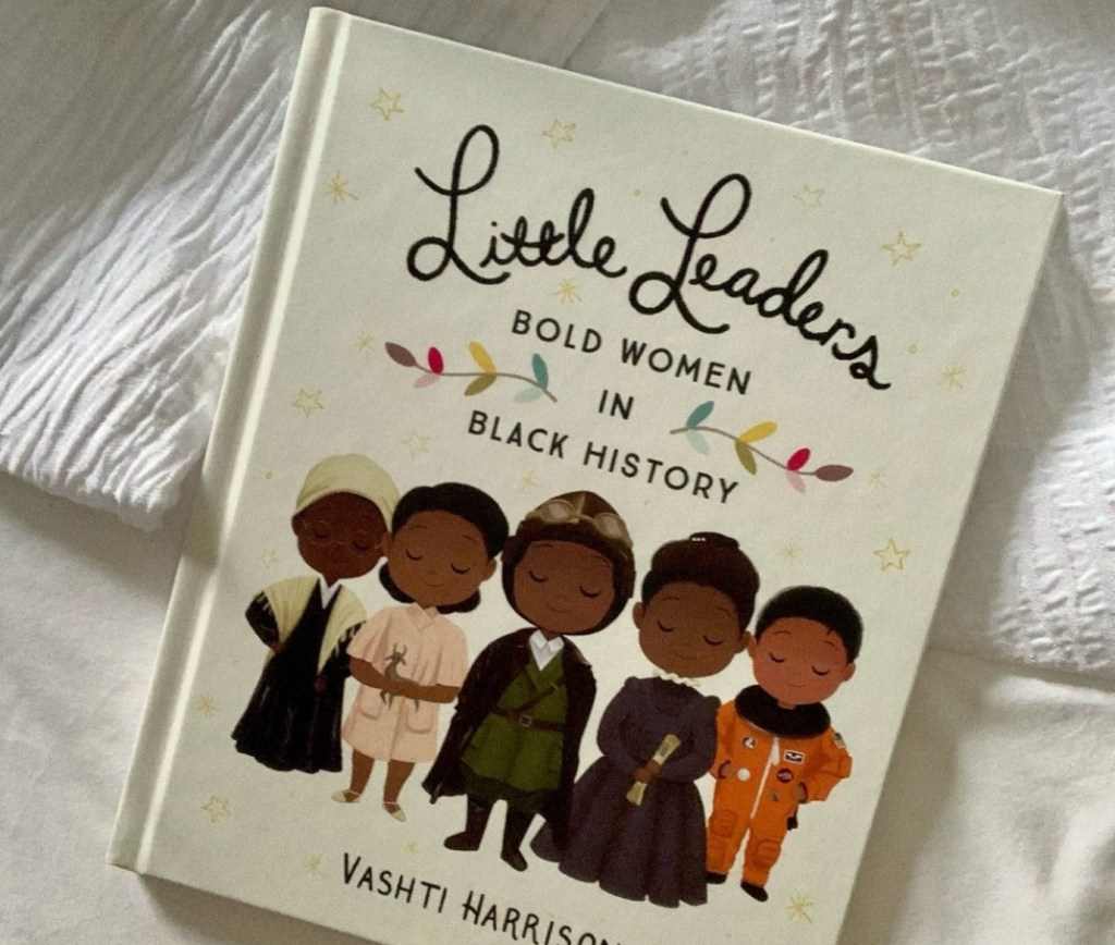 Little Leaders Bold Women in Black History Book sitting on a white blanket