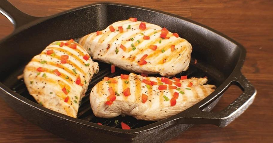 chicken breast with tomatoes inside lodge grill pan