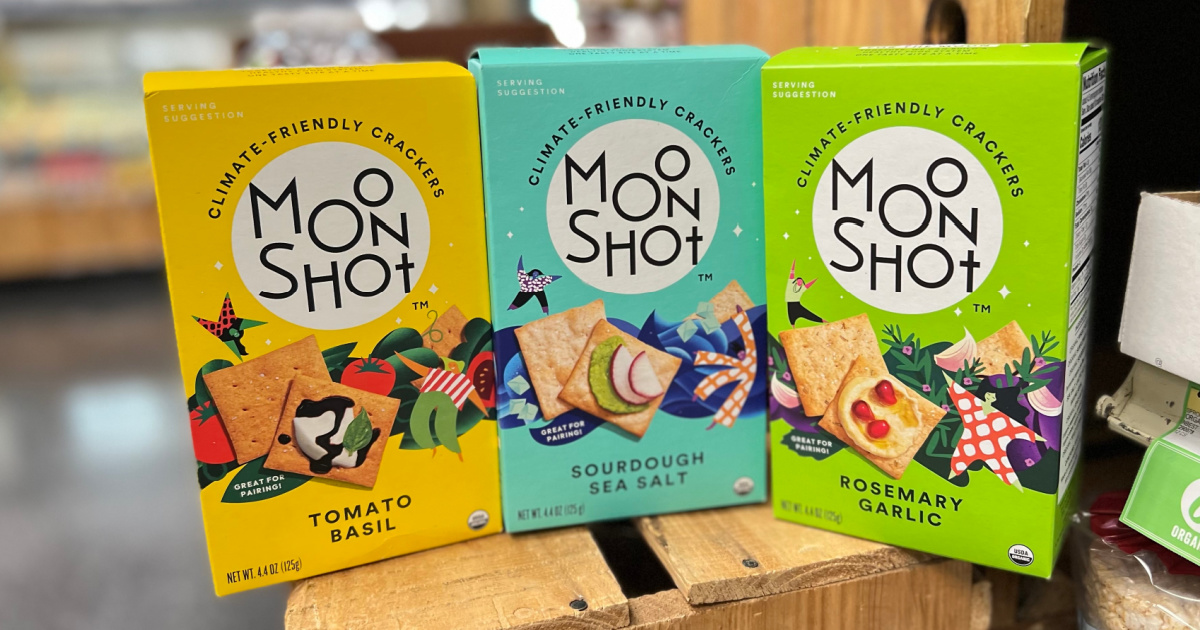 three boxes of moonshot crackers on display in a store