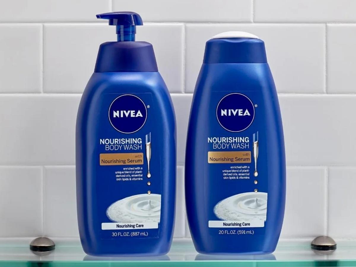 two bottles of nivea body wash on a bathroom shelf