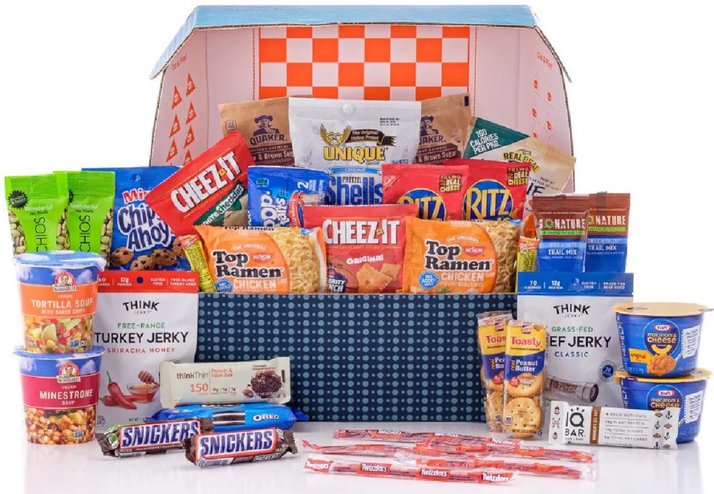 candy, snacks, and food in gift shipping box
