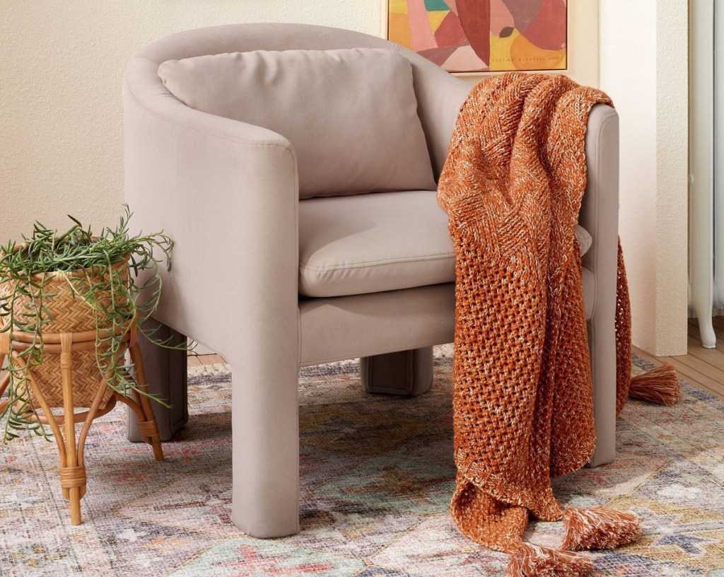chair with a throw blanket on it