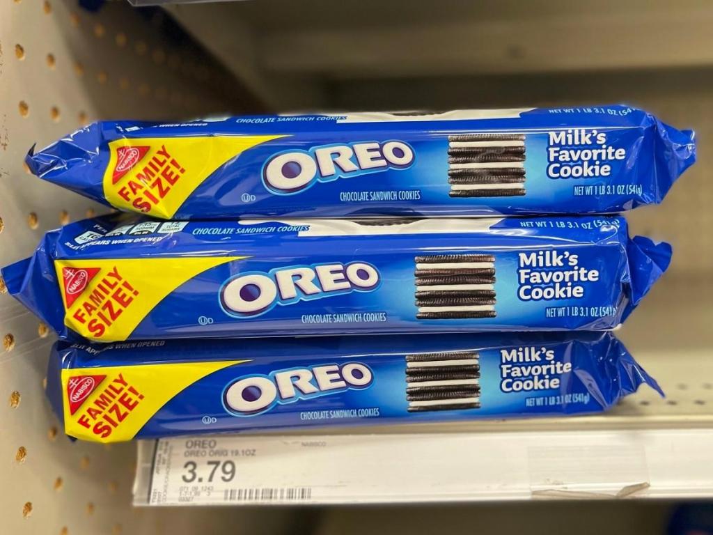three packages of oreo cookies on shelf