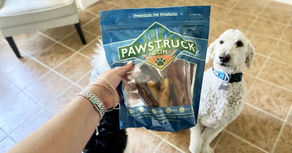 holding bag of pawstruck treats