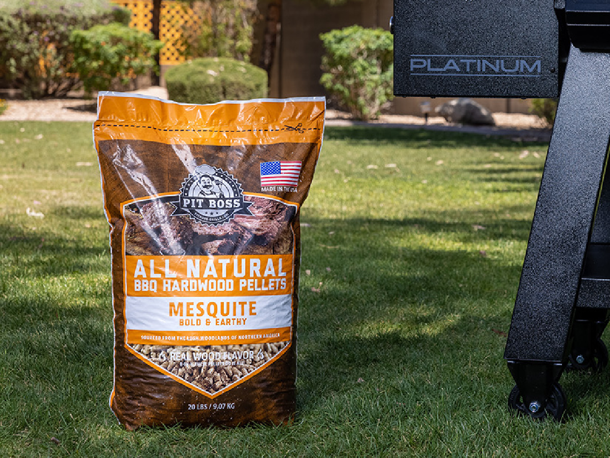 large bag of wood pellets next to outdoor grill