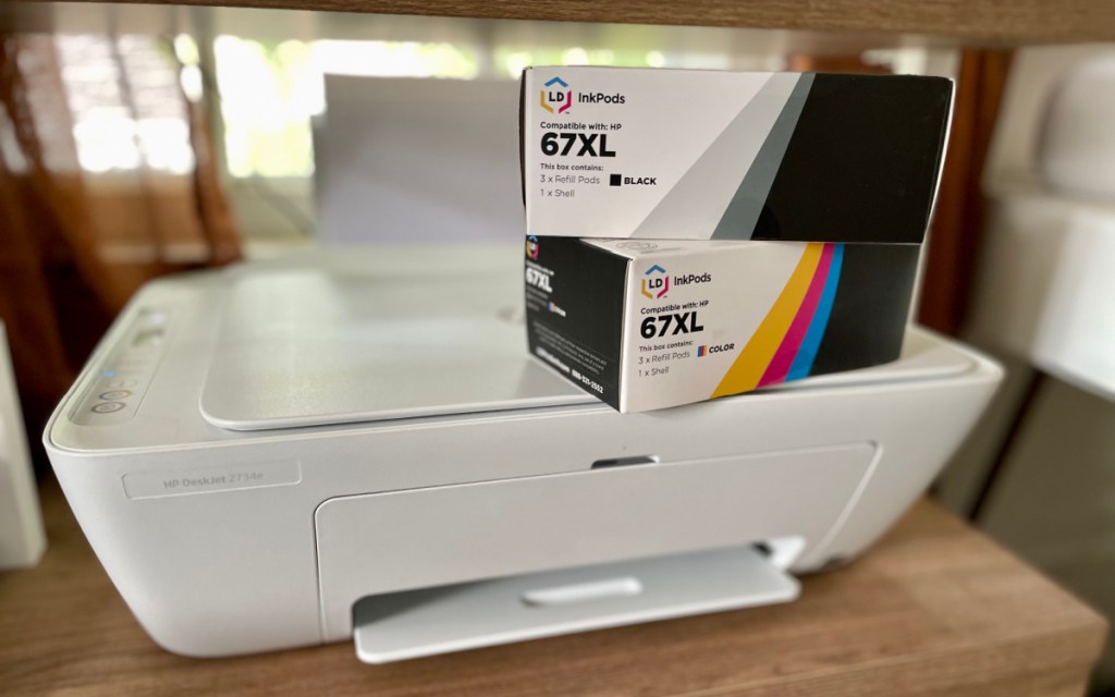 A home printer with ink cartridges on top from Inkcartridges.com