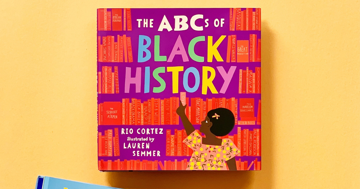 hardcover abcs of black history children's book against a yellow background
