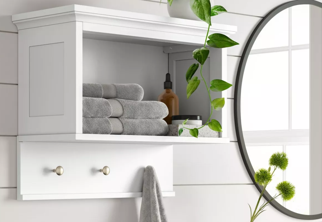 wall shelf with towels on it