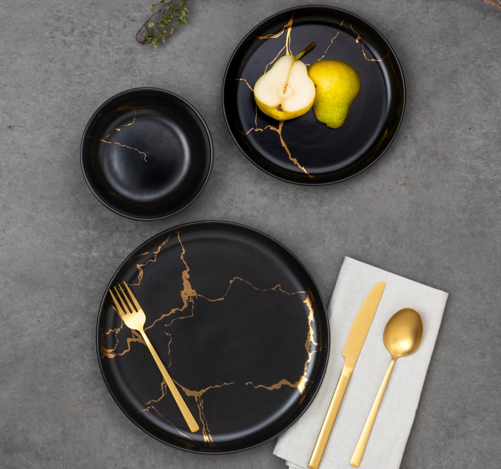black and gold marble dinnerware pieces