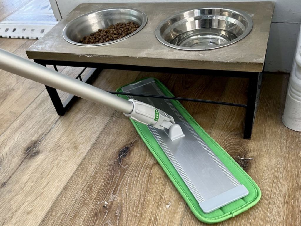 Turbo Mop being used to clean under raised dog bowls