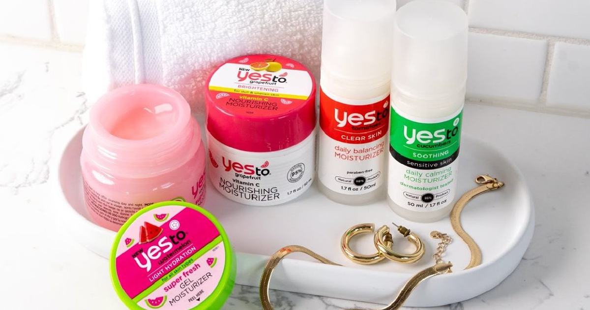 various skincare products and jewelry on bathroom counter