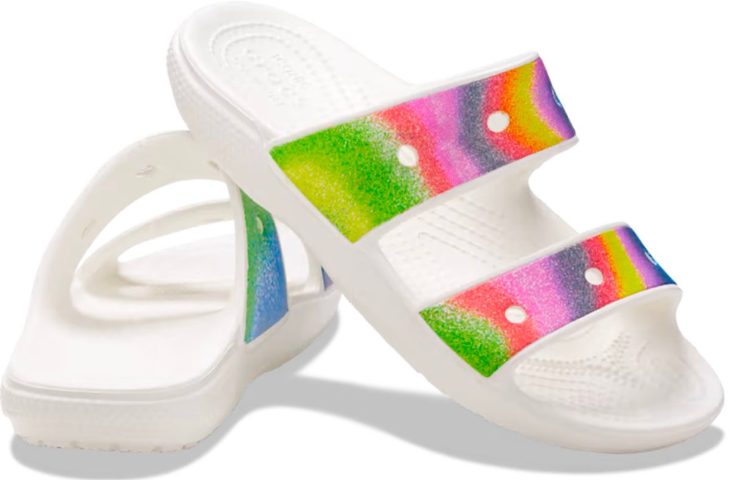 white and rainbow crocs stock image