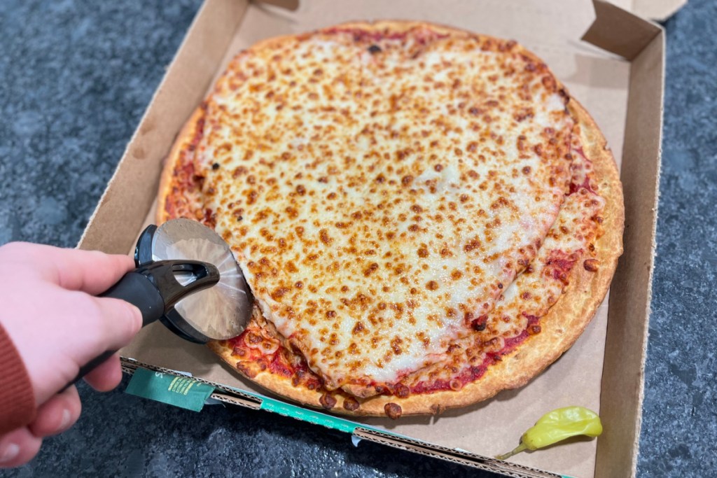 cutting pizza into heart shaped