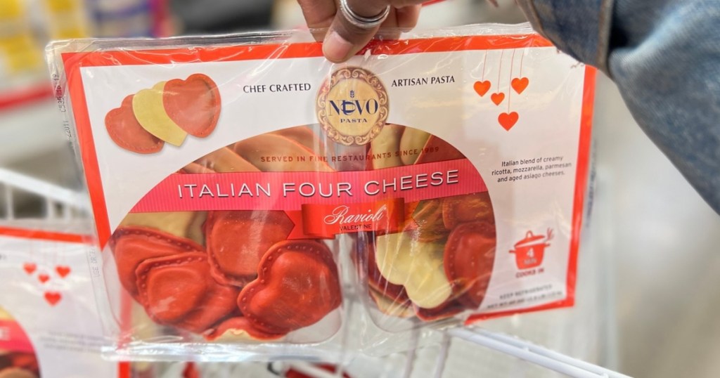holding a package of heart-shaped ravioli