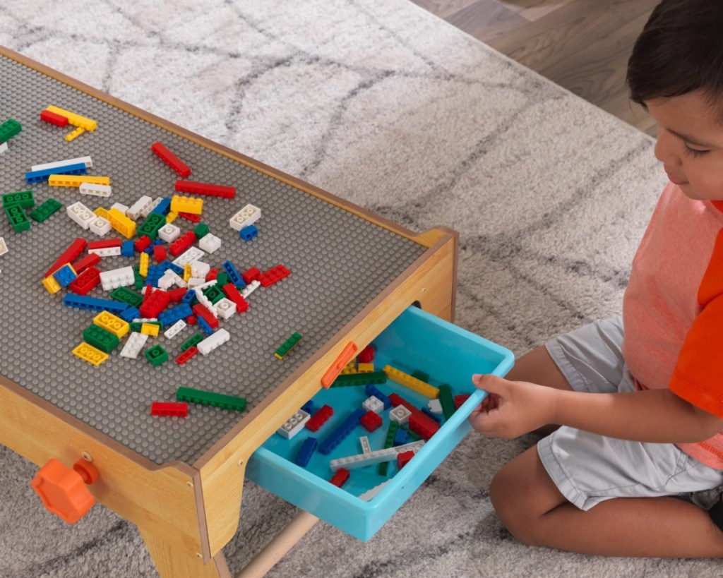 legos in drawer under table