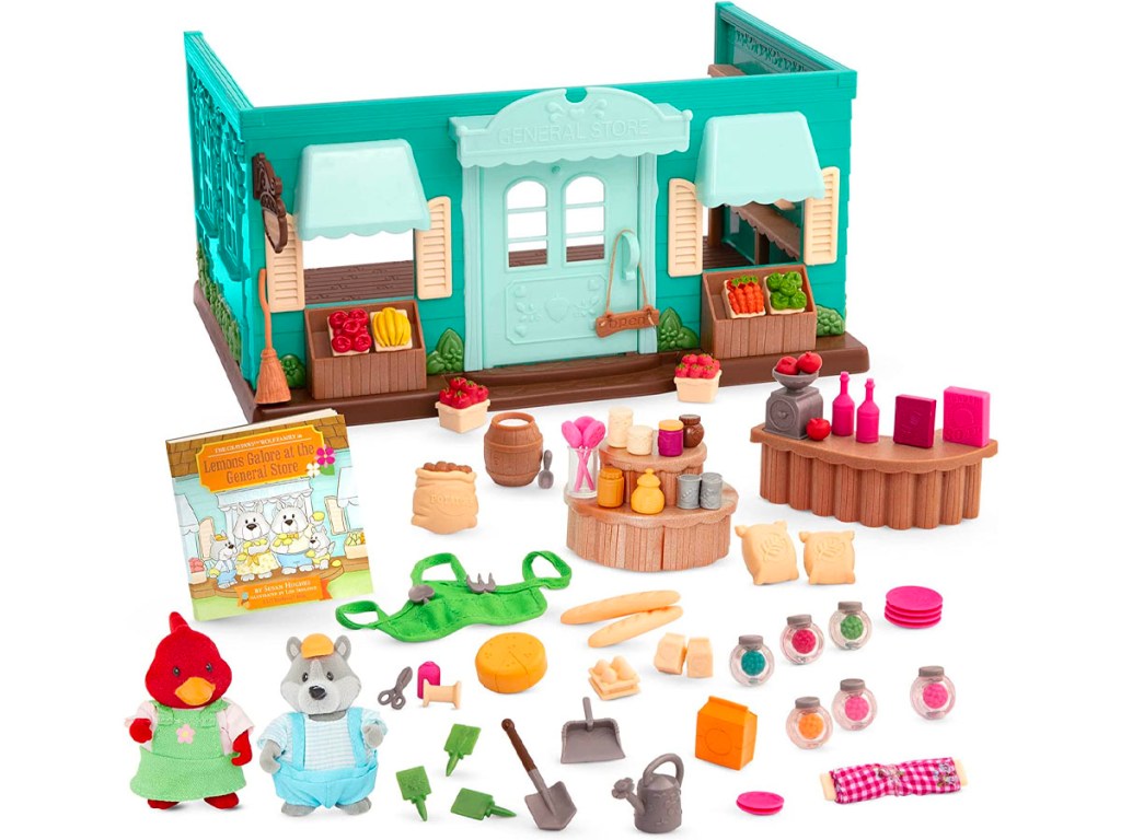 lil woodzeez playset with accessories laid in front of it