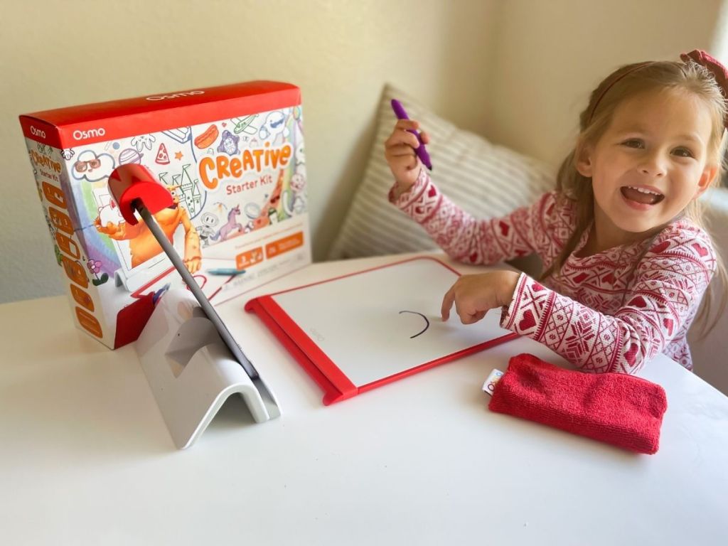 little girl using Osmo Creative Starter Kit