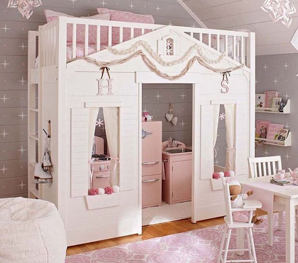 pink and white playhouse bed in girly room