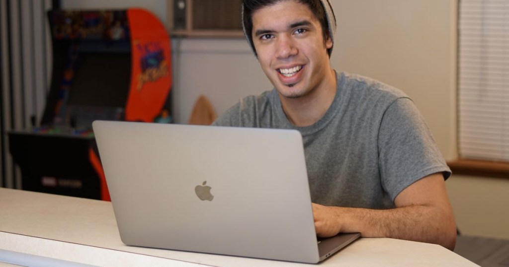 man using a macbook