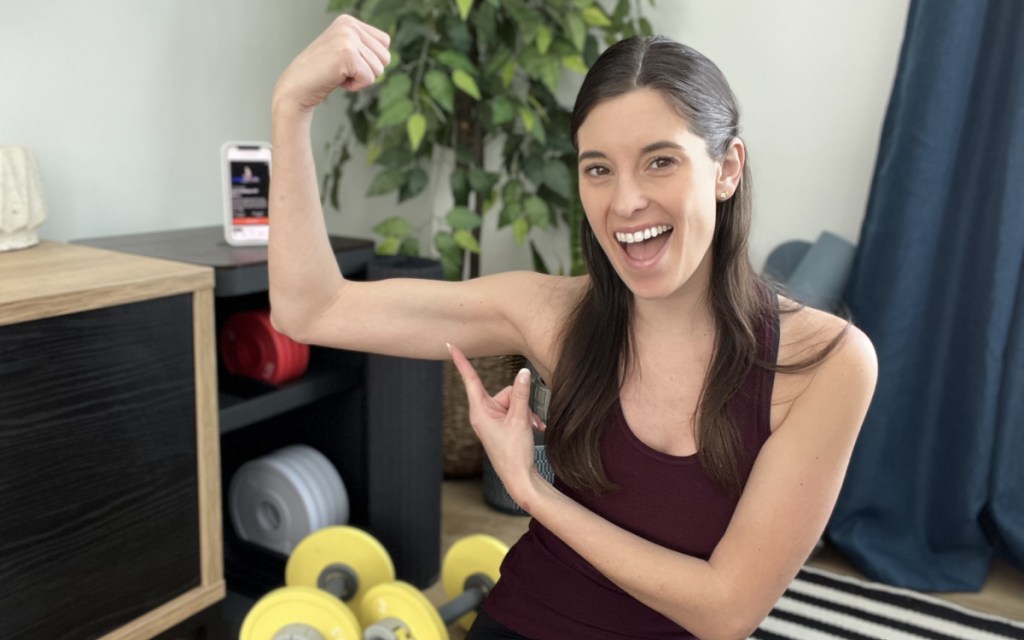 emily showing off arm muscles from tempo move