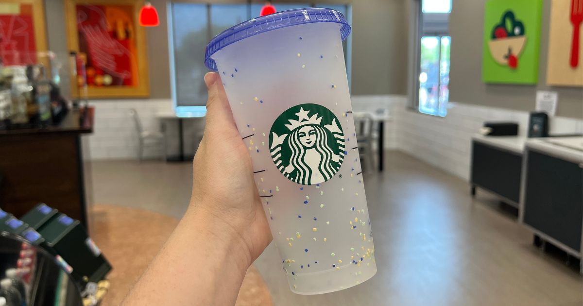 hand holding Starbucks confetti color changing cup 