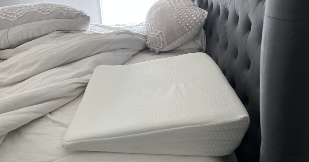 wedge pillow on bed