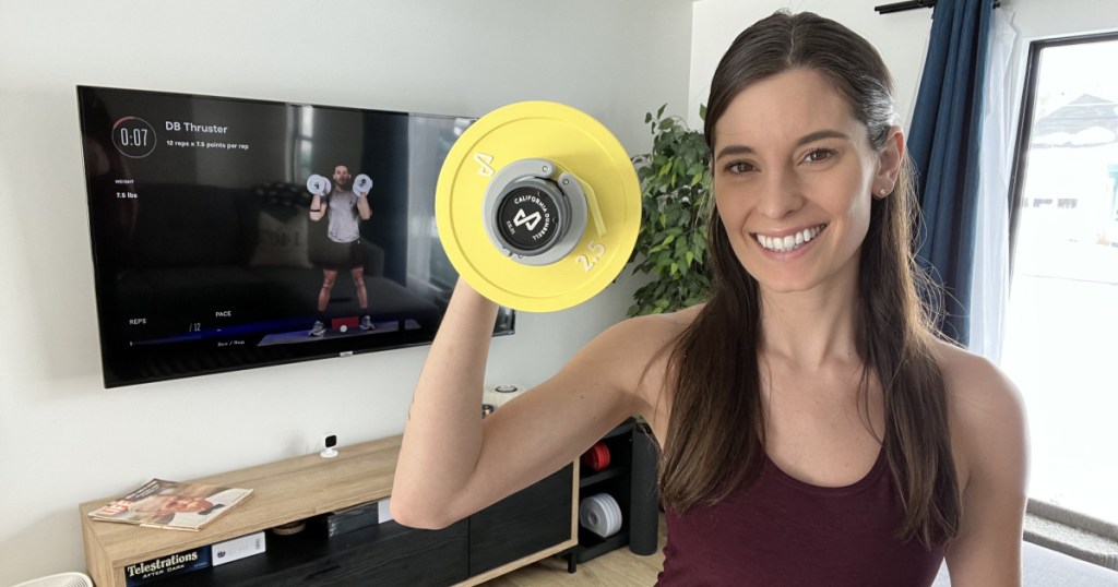 woman with tempo move weights and on tv