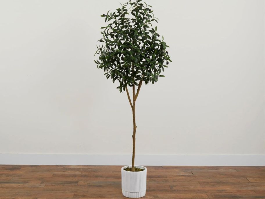artificial olive tree in white planter