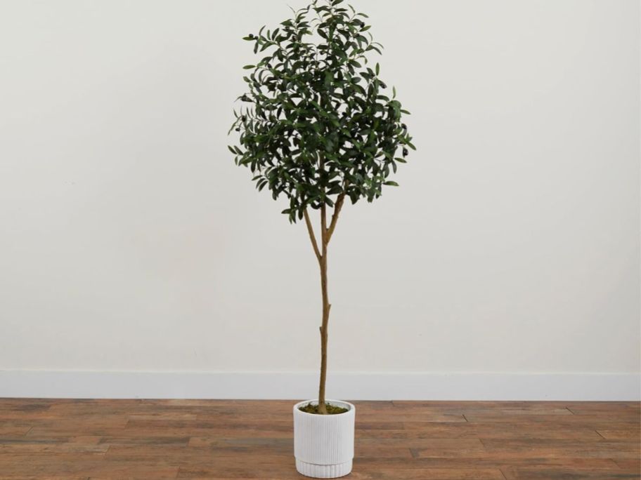 artificial olive tree in white planter